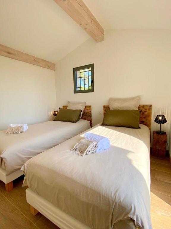 Postel nebo postele na pokoji v ubytování Le Cabanon