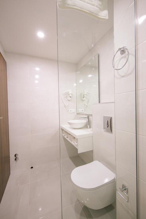 Koupelna v ubytování Orden Hotel