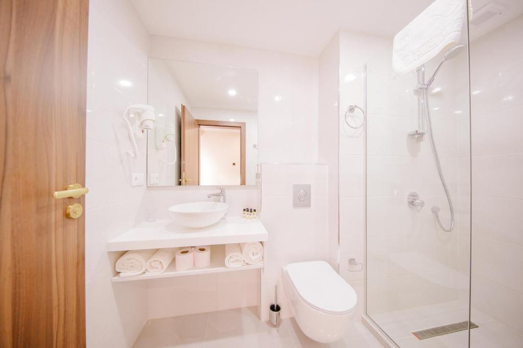 Koupelna v ubytování Orden Hotel