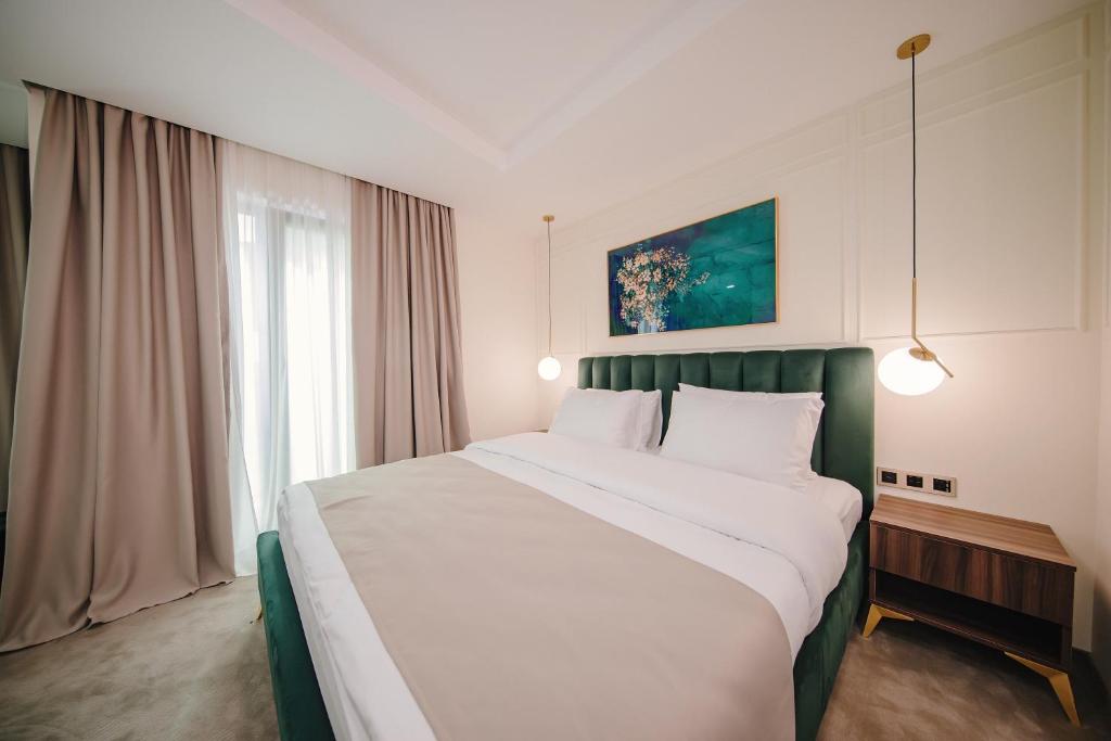 Postel nebo postele na pokoji v ubytování Orden Hotel