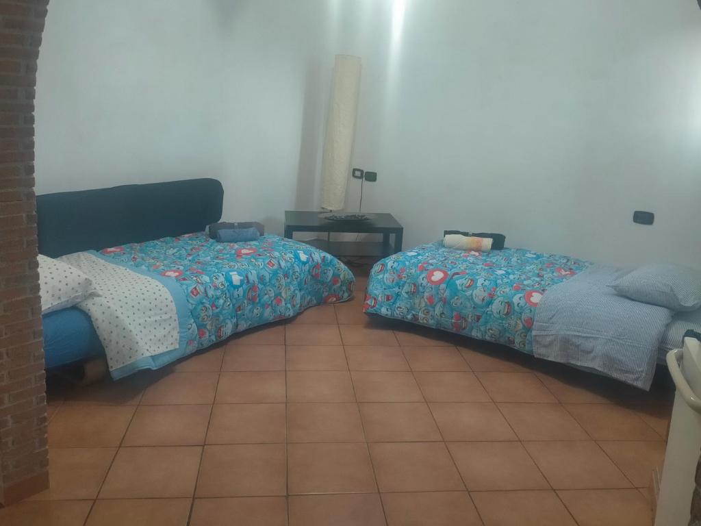 Postel nebo postele na pokoji v ubytování Civico Ventitre