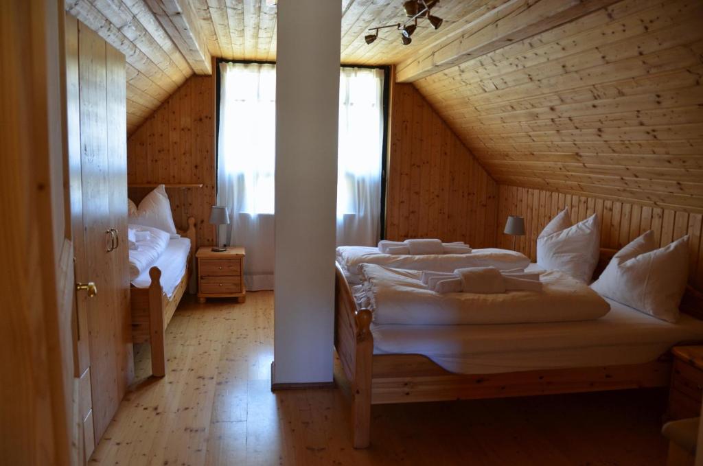 Postel nebo postele na pokoji v ubytování FERIENHAUS WALDTRAUM