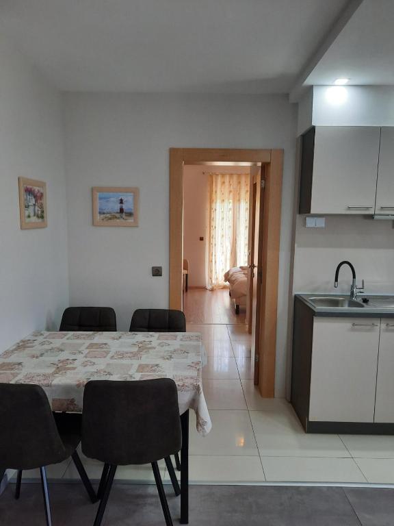 Kuchyň nebo kuchyňský kout v ubytování Apartman Eden