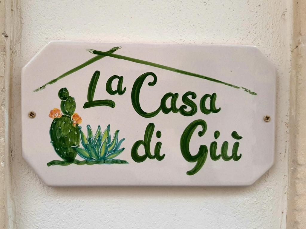 Un cartello che dice la casa de cuirassée di Casa di Giù a Scicli