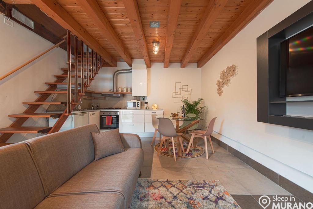 Posezení v ubytování MURANO Place - RIVA - Duplex