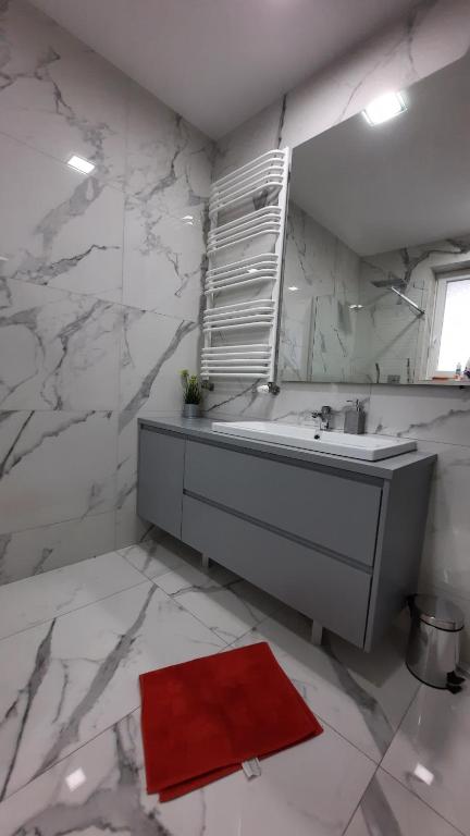 Kúpeľňa v ubytovaní Apartament Widok z tarasami
