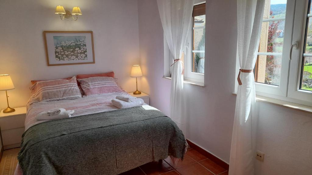 Postel nebo postele na pokoji v ubytování Mirador de Garabandal