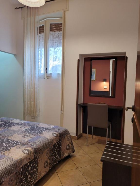 Postel nebo postele na pokoji v ubytování B&B La Filanda