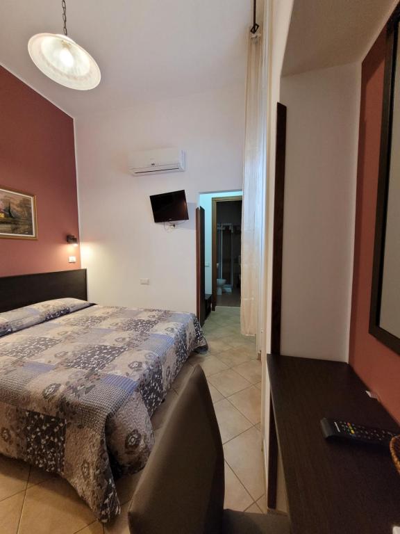 Postel nebo postele na pokoji v ubytování B&B La Filanda