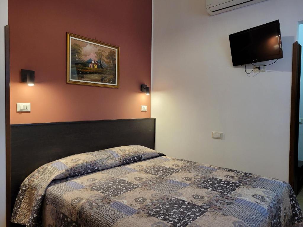 Postel nebo postele na pokoji v ubytování B&B La Filanda
