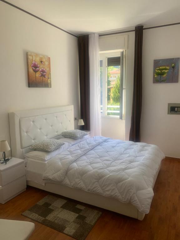 Postel nebo postele na pokoji v ubytování Albergo al lago
