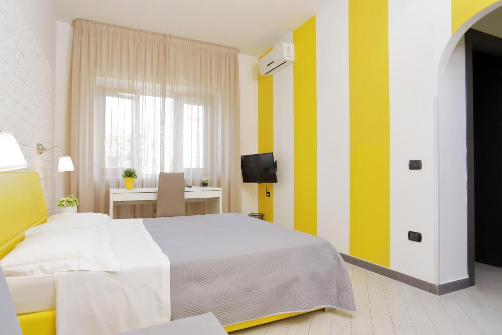 Posteľ alebo postele v izbe v ubytovaní Guest House Le Tre Isole Sorrento