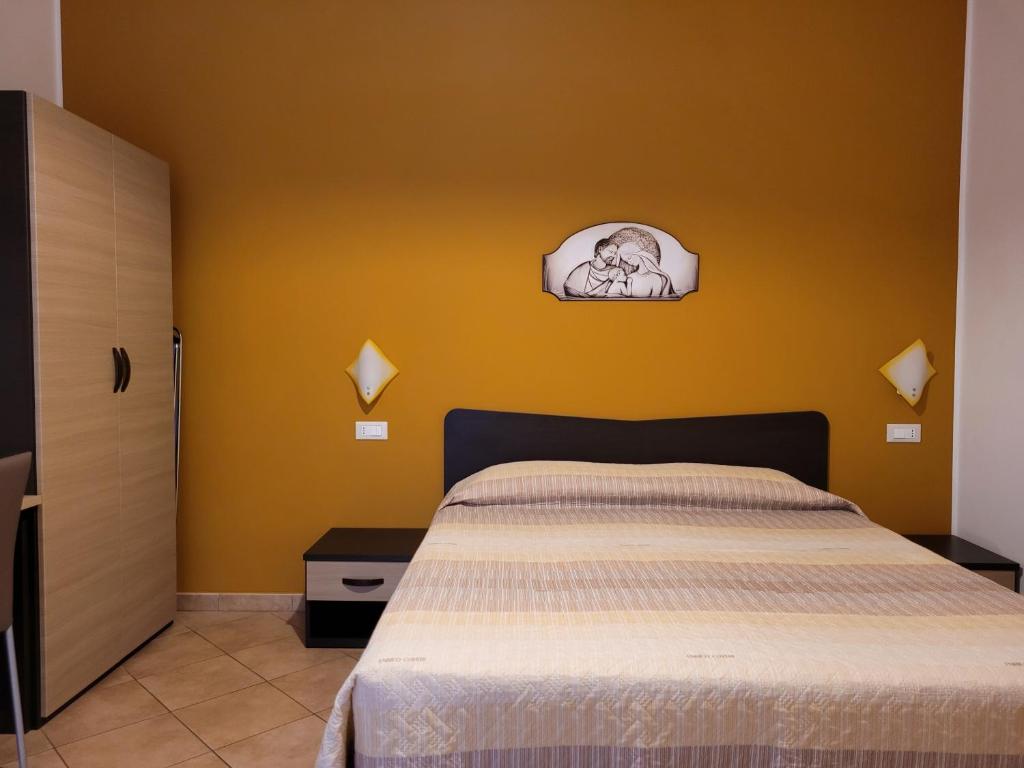Postel nebo postele na pokoji v ubytování B&B La Filanda
