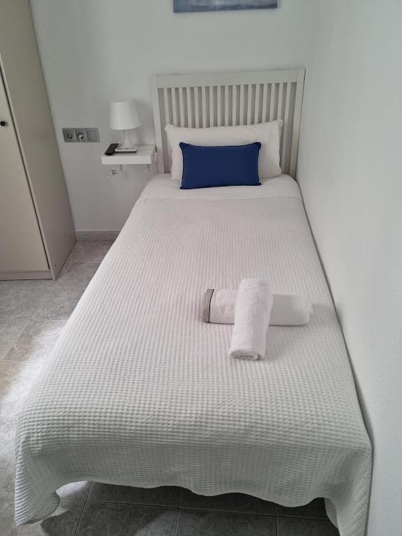 Postel nebo postele na pokoji v ubytování Hostal Nerjasol