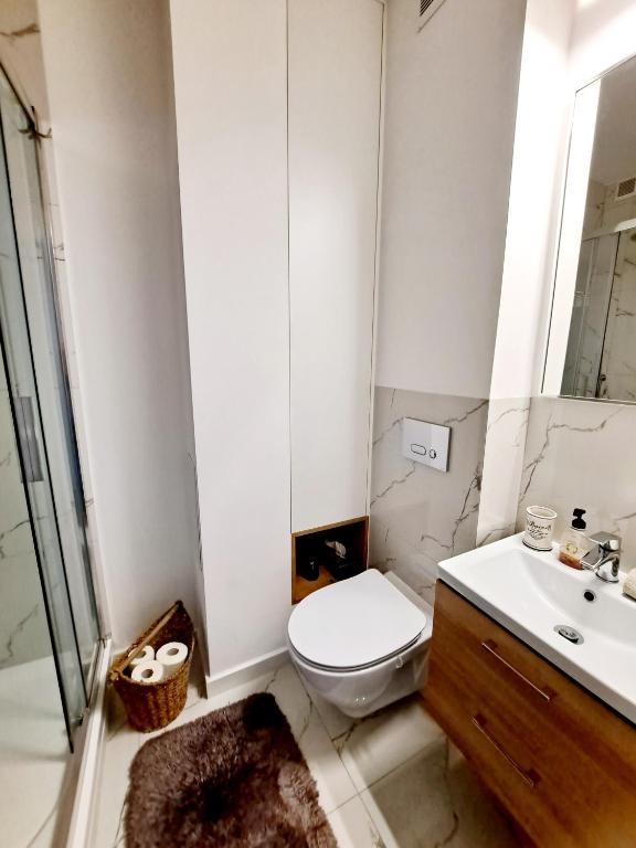 Kúpeľňa v ubytovaní Łuczański Apartament w sercu Giżycka