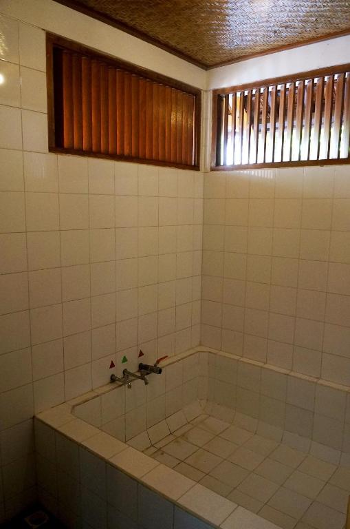 Koupelna v ubytování Kampung Sumber Alam Garut