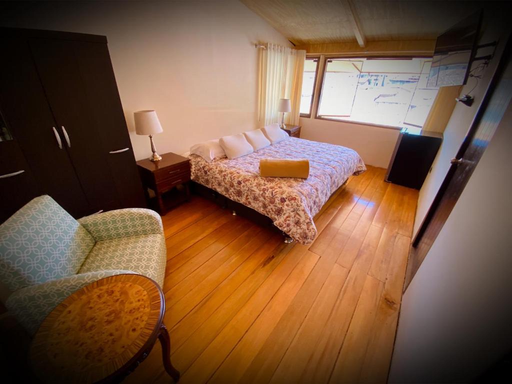 Postel nebo postele na pokoji v ubytování Cusco Hotel Boutique