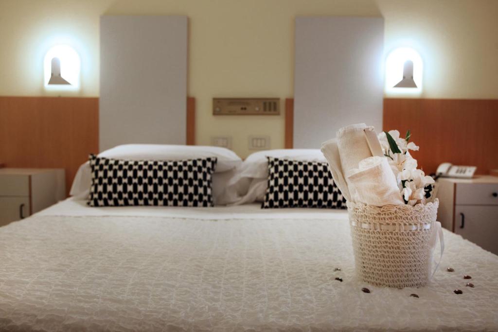 Postel nebo postele na pokoji v ubytování Hotel Bel Air