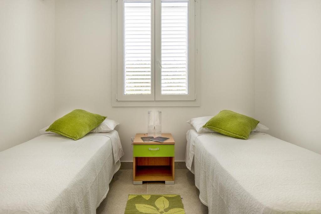 Postel nebo postele na pokoji v ubytování Le Perseidi Eco Home San Lorenzo