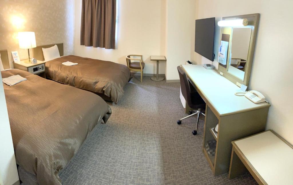 Postel nebo postele na pokoji v ubytování Hotel Yassa