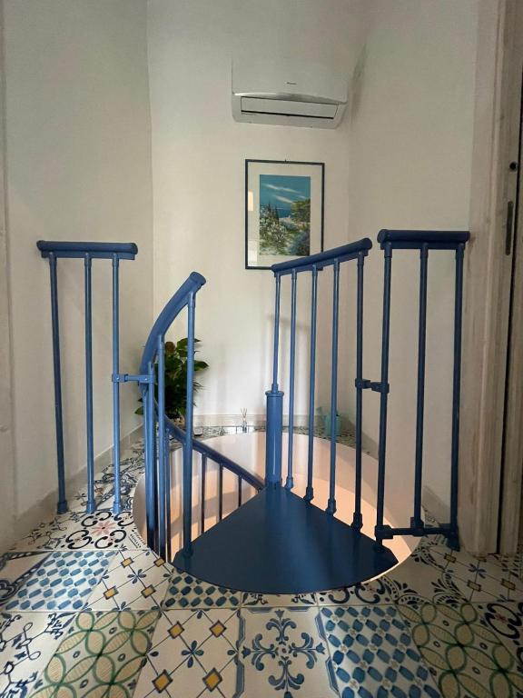 A bed or beds in a room at Petit Maison Jeranto
