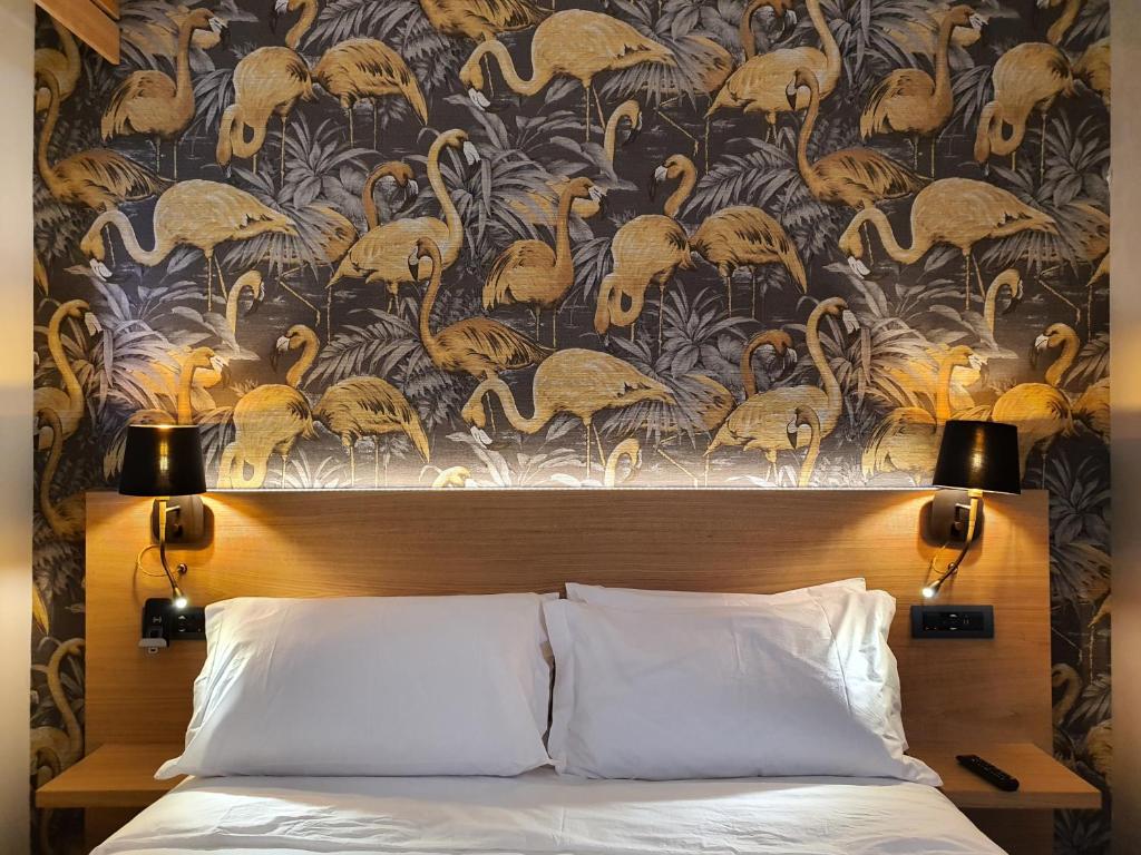 A bed or beds in a room at Porta Romana Gold Suite