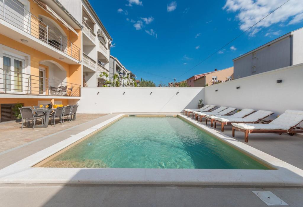 Bazén v ubytovaní Apartment Jakov with a pool alebo v jeho blízkosti