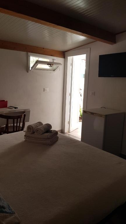 Postel nebo postele na pokoji v ubytování Aliga