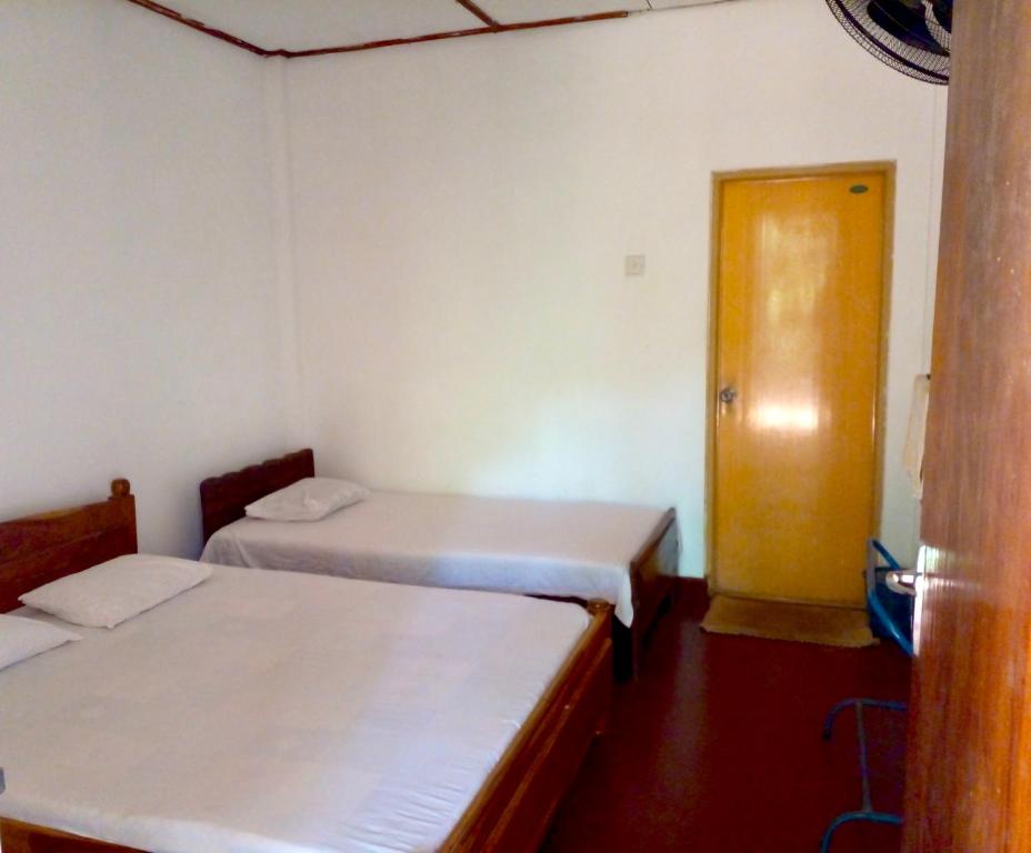 Postel nebo postele na pokoji v ubytování Nugasewana Guest