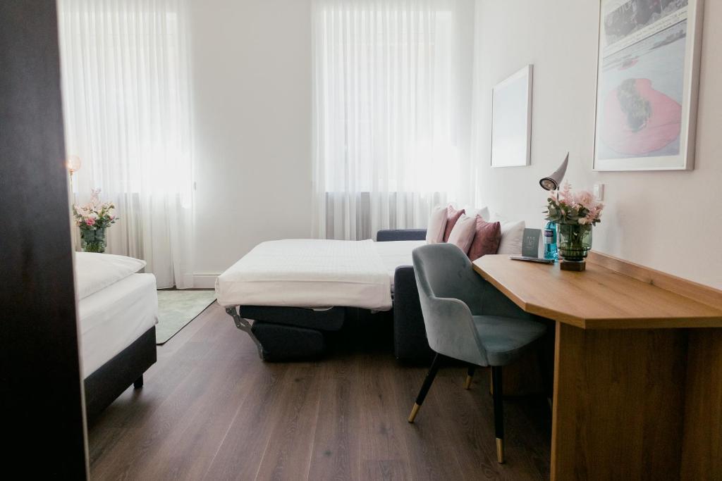 Postel nebo postele na pokoji v ubytování DOM Hotel LIMBURG