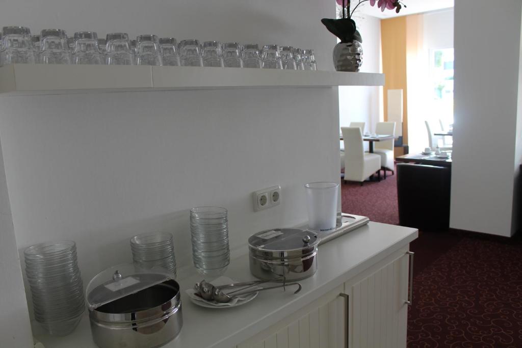 Kuchyň nebo kuchyňský kout v ubytování Wiking Hotel