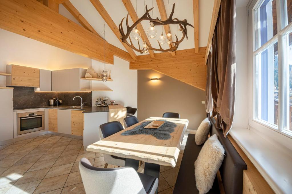 Kuchyň nebo kuchyňský kout v ubytování Attico Faloria Luxury
