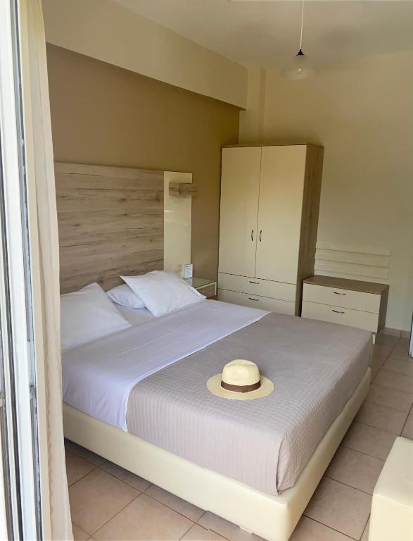 Postel nebo postele na pokoji v ubytování Poseidon Studios & Apartments