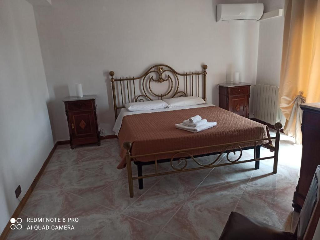 Posteľ alebo postele v izbe v ubytovaní Casa Chiarenza