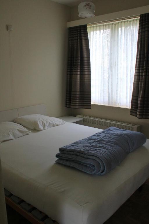 Postel nebo postele na pokoji v ubytování Apartment Cuypers