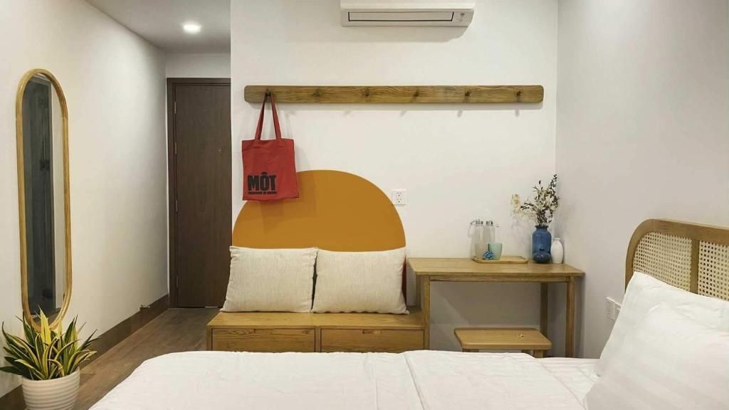 Postel nebo postele na pokoji v ubytování Lacovy Home Hội An