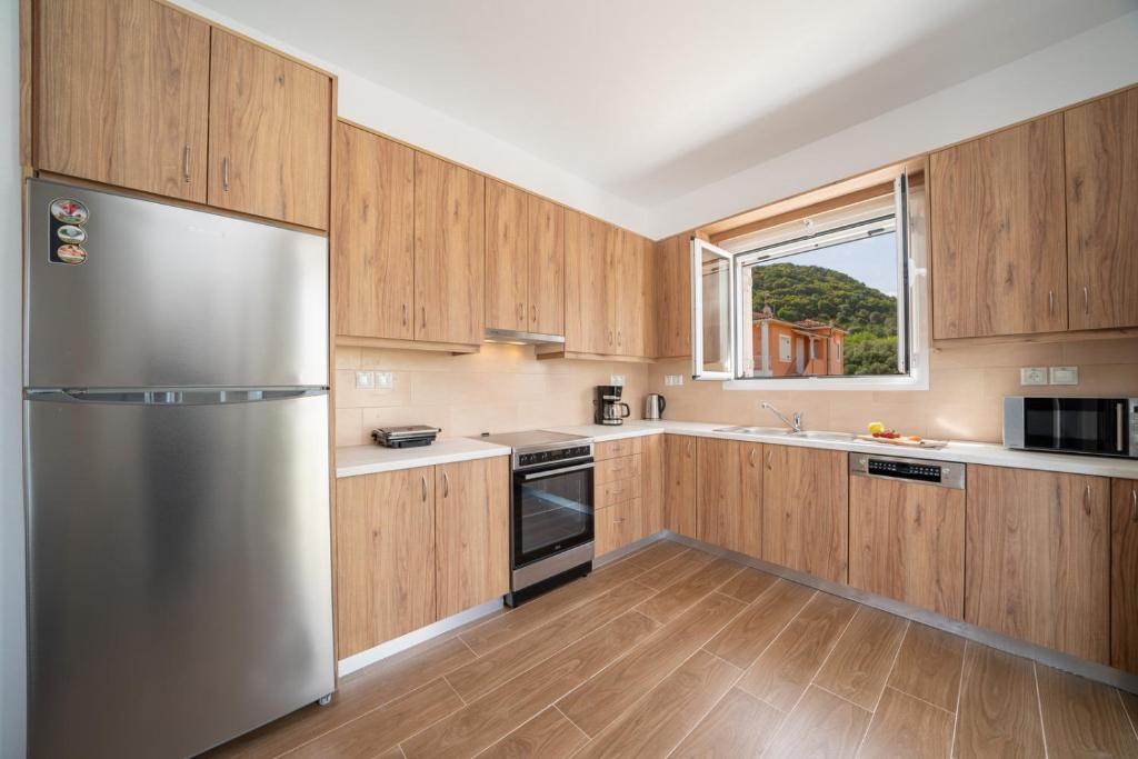 Kuchyň nebo kuchyňský kout v ubytování Ilias Apartments
