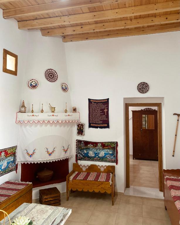 Postel nebo postele na pokoji v ubytování Archangelos Family House