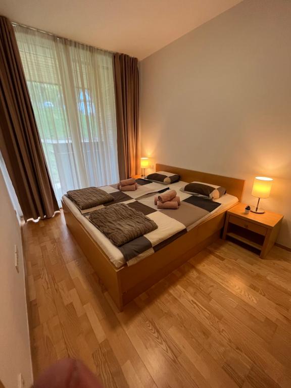 Ένα ή περισσότερα κρεβάτια σε δωμάτιο στο Golden Fox Apartment Pohorje