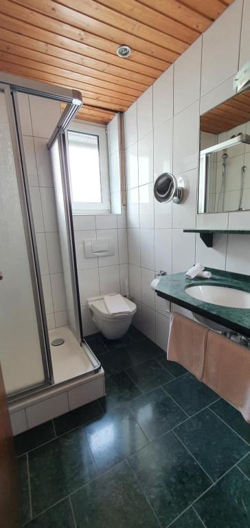 Koupelna v ubytování Hotel Schön