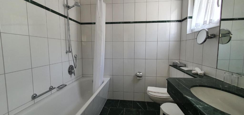 Koupelna v ubytování Hotel Schön