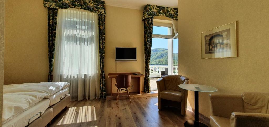 Postel nebo postele na pokoji v ubytování Hotel Schön