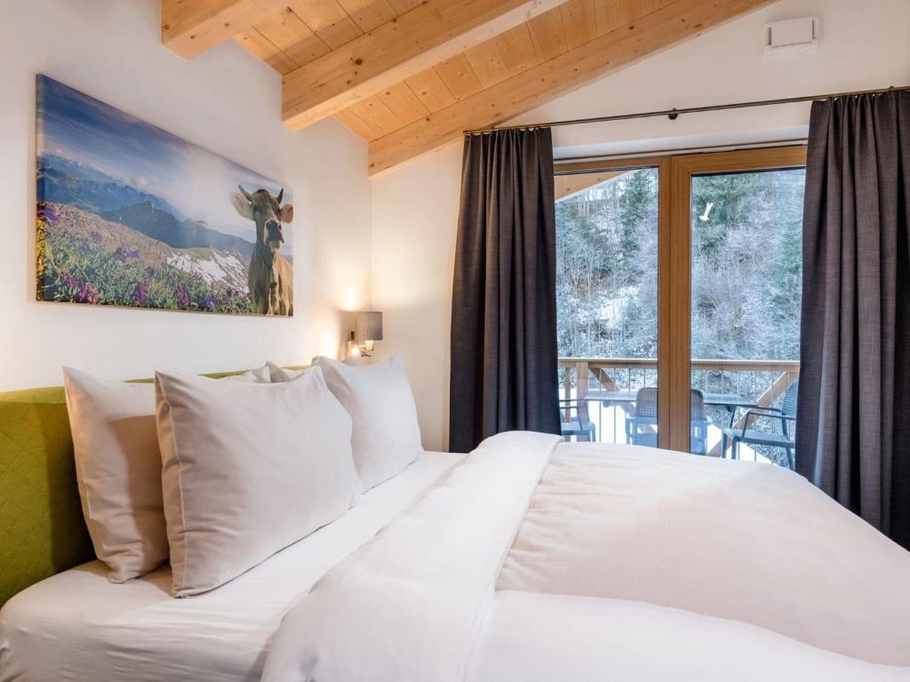 Кровать или кровати в номере Holiday home in M hlbach am Hochk nig with ski storage