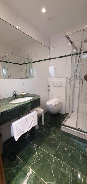 Koupelna v ubytování Hotel Schön