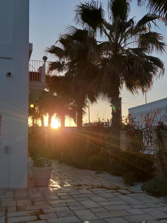 The sunrise or sunset as seen from a panziókat or nearby