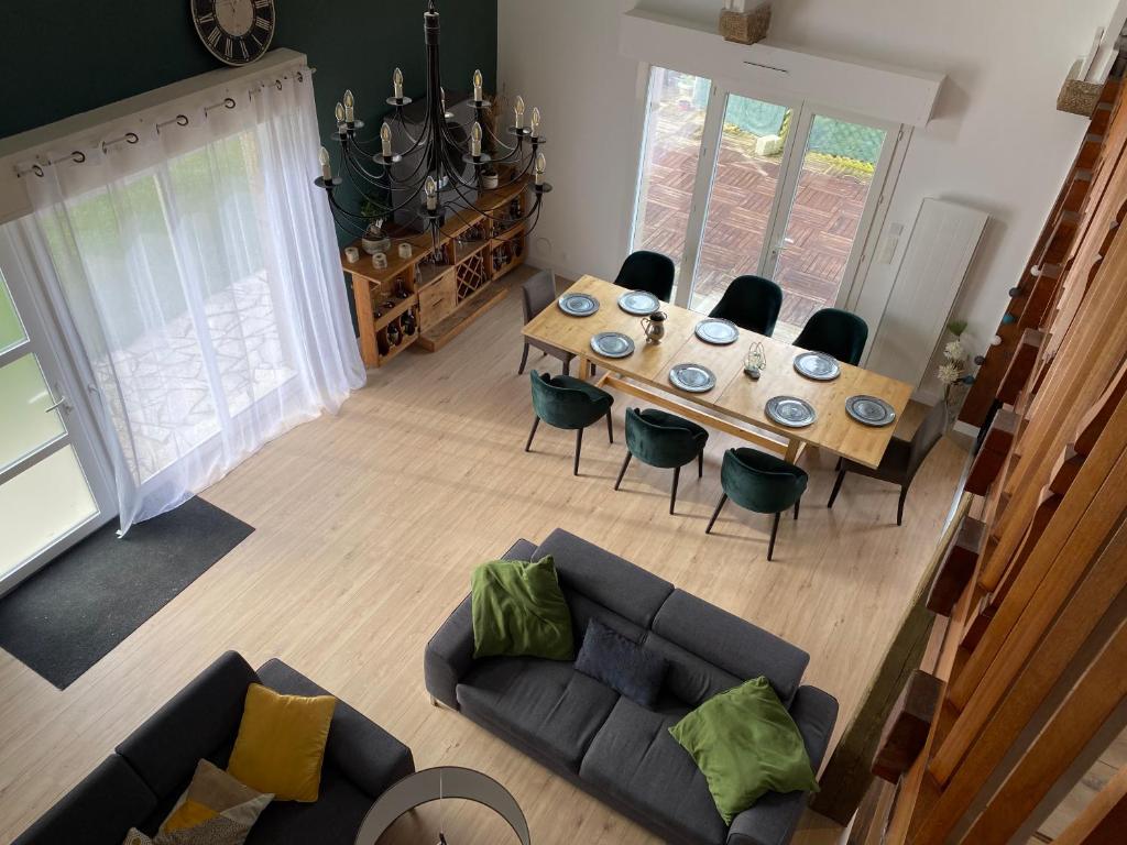 an overhead view of a living room with a table and chairs at Chez Catherine et Laurent in Ploemeur