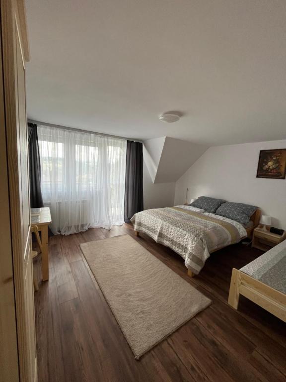Postel nebo postele na pokoji v ubytování Pod Cisowcem