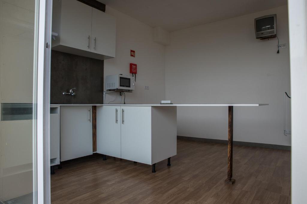 Kuchyň nebo kuchyňský kout v ubytování GarçaView