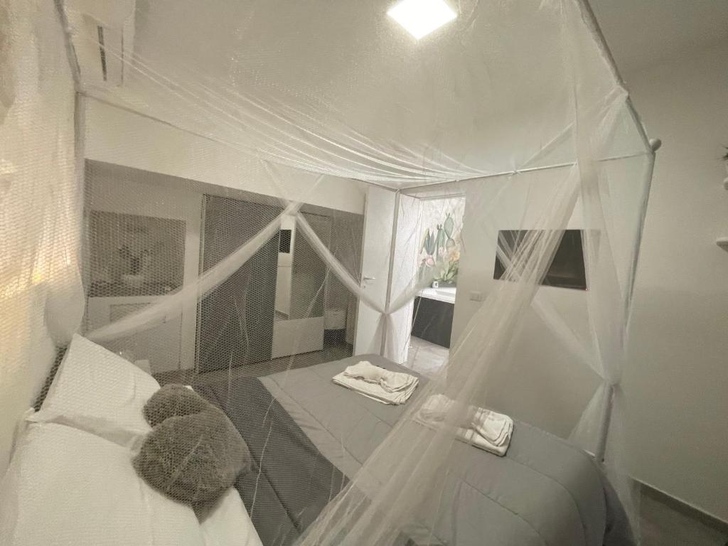 Łóżko lub łóżka w pokoju w obiekcie SiricyAus Luxury Room