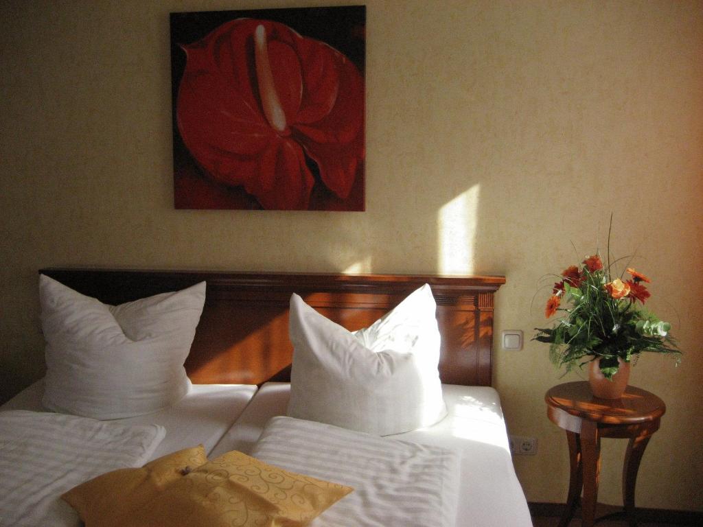 Postel nebo postele na pokoji v ubytování Altstadthotel Schex